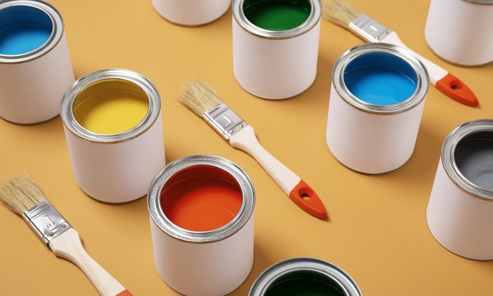 colorful-paint-cans-arrangement-high-angle