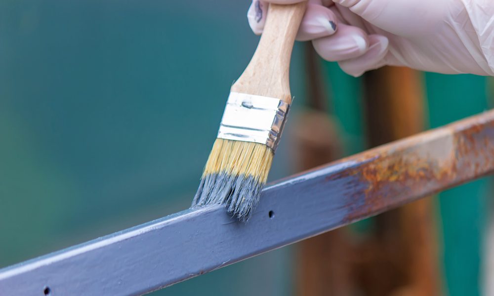 paint the iron frame with gray paint. selective focus